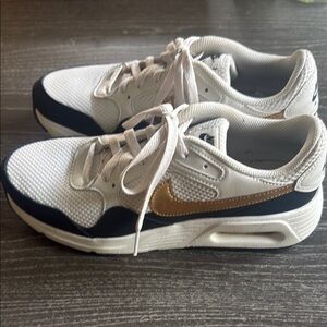 Nike Women’s White and Gold Sneakers